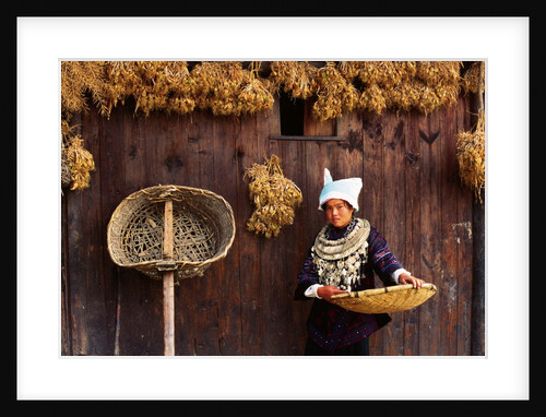 Miao Woman and Drying Produce by Anonymous