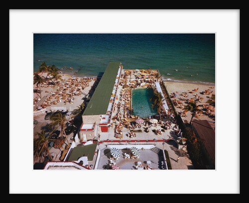 People Enjoying Pool at Beach Resort by Anonymous