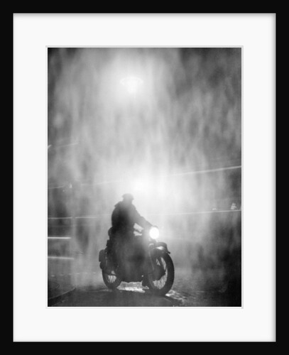Riding a Motorcycle in Rainy Night by Anonymous