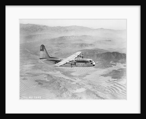 Airplane Flying Over Landscape by Anonymous