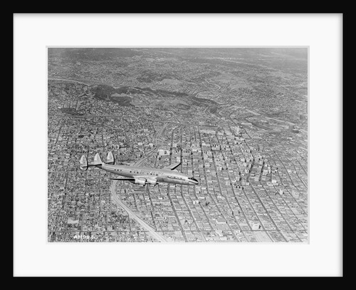 Airplane Flying Over Los Angeles by Anonymous