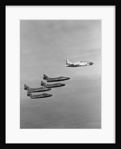 The Lockheed T2V-1 SeaStar Teaming up with the Blue Angels Stunt Team by Anonymous