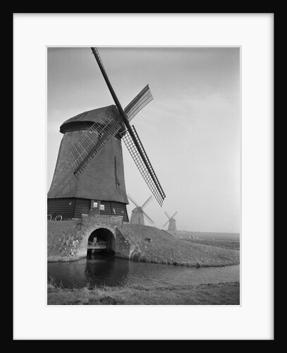 View of Windmills Overlooking Lake by Anonymous