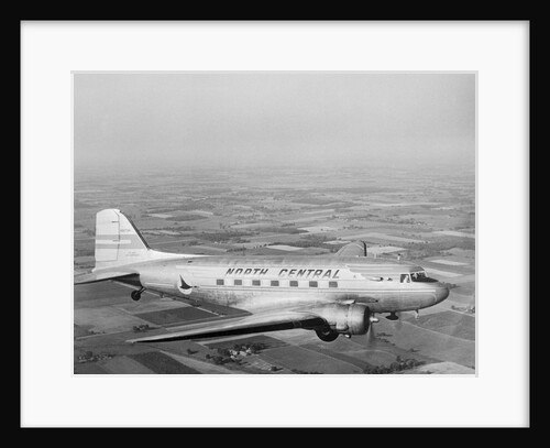 Douglas DC-3 Plane in Flight by Anonymous
