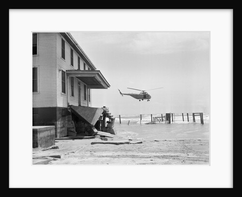 Helicopter Flying Over Storm Ridden Area by Anonymous