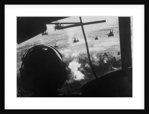 Bell UH-1 Huey Squadron Firing on Vietcong by Anonymous