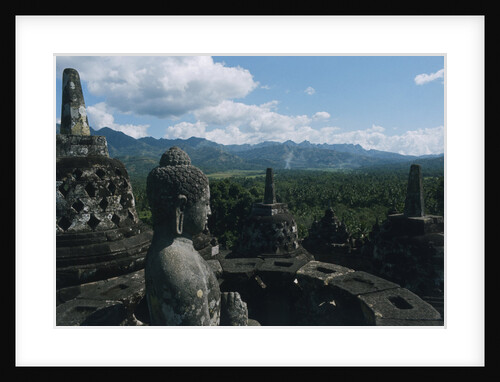 Statue of Buddha Sitting in a Stupa on Candi Borobudur by Anonymous