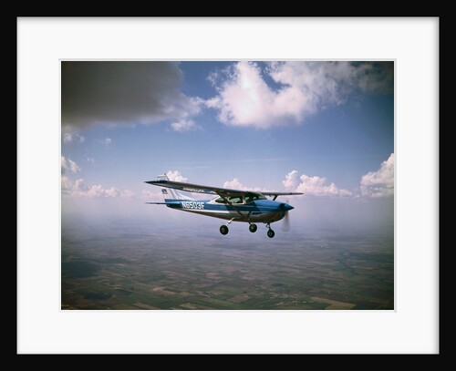 Cessna 182 Flying by Anonymous