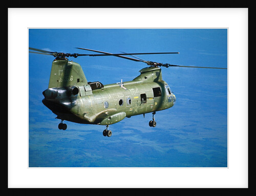 Military Helicopter Flying in Blue Skies by Anonymous