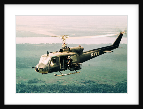 American Gunners Firing from Helicopter in Vietnam by Anonymous