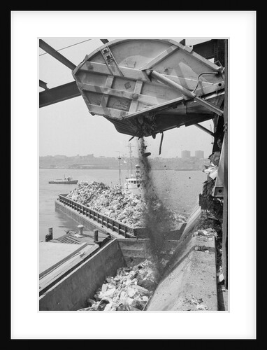 Machine Loading Garbage onto Barge by Anonymous