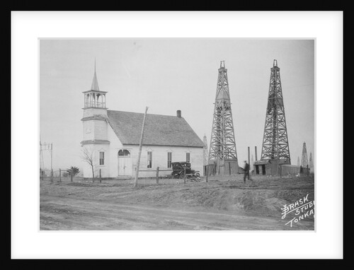 Oil Well Construction Behind Church by Anonymous