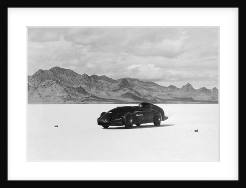 G.E.T. Eyston Breaking Speed Record in Automobile by Anonymous