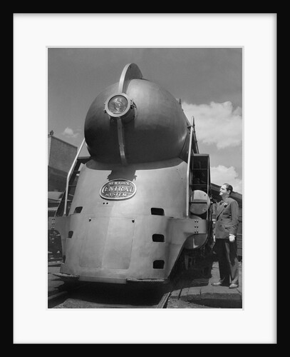 Inventor Standing by His Train Model by Anonymous