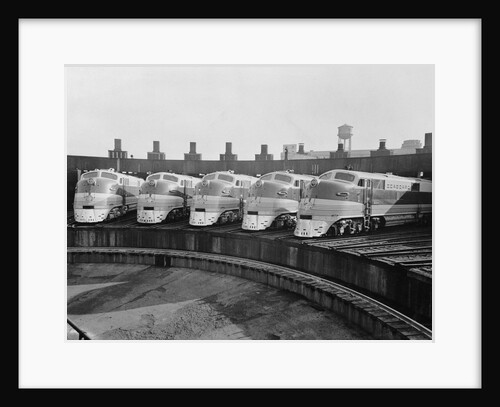 View of Parked Passenger Trains by Anonymous