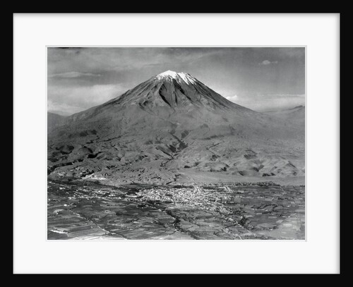 View of City Underneath Large Mountainous Region by Anonymous