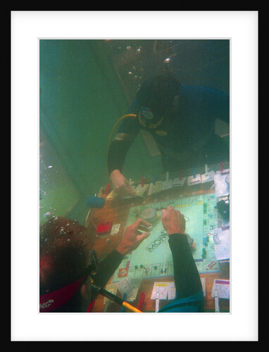 Divers Playing Monopoly Underwater by Anonymous