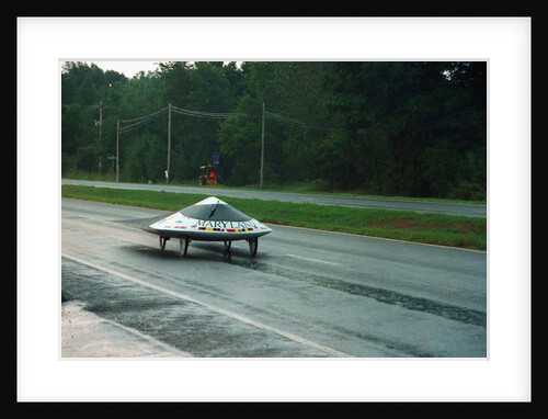 Solar Powered Automobile Stopping in Rain Storm by Anonymous