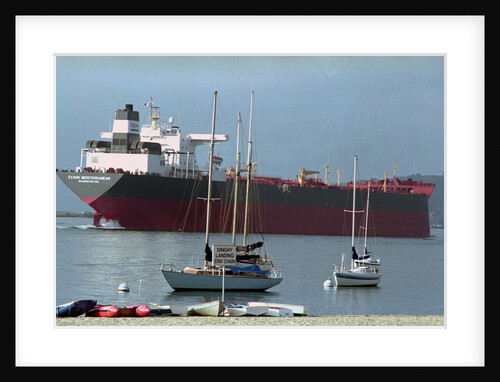 Exxon Mediterranean in Harbor Alongside Boats by Anonymous