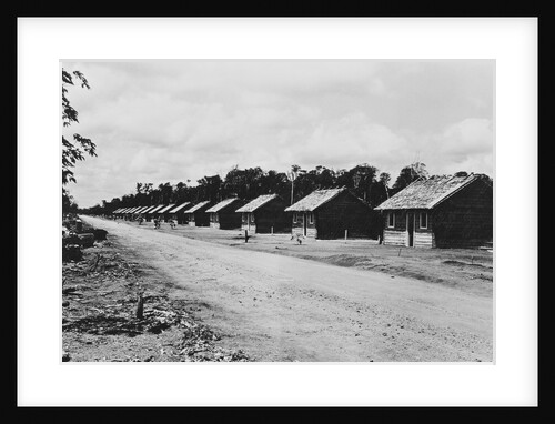Cottages Lining Dirt Road by Anonymous