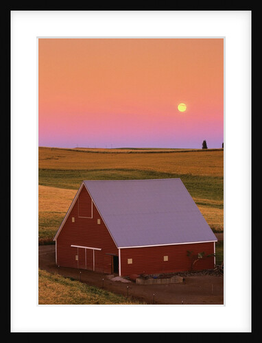 Sun Setting Behind Barn by Anonymous