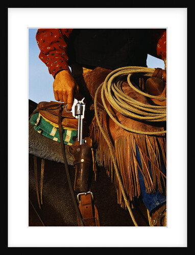Close-up of Cowboy Holding Gun by Anonymous
