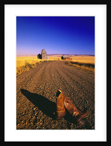Cowboy Boots on Gravel Road by Anonymous