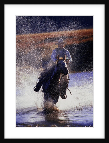 Cowboy Riding Horse Through River by Anonymous