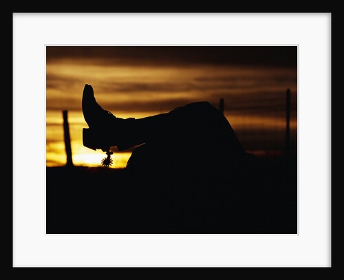 Cowboy's Boot and Spur Silhouetted at Sunrise by Anonymous