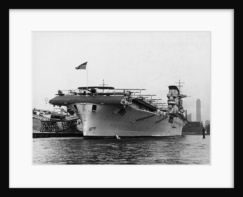 An Aircraft Carrier at a Pier by Anonymous
