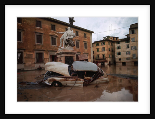 Wrecked Car Near Statue by Anonymous
