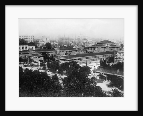 Rooftops and Tree Lines in Japanese City View by Anonymous