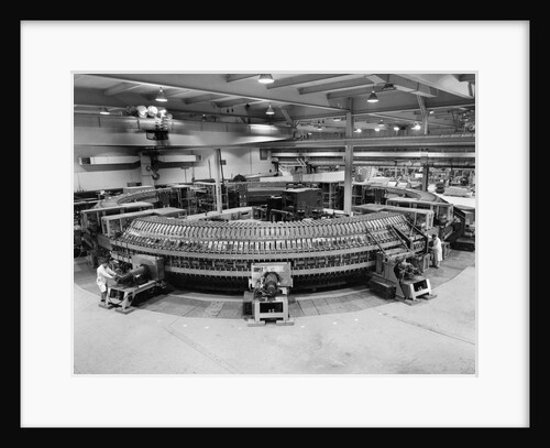 Technicians Near Circular Electronic Device by Anonymous