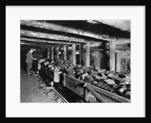 Miner Examining Load of Coal at Mouth of Pit by Anonymous