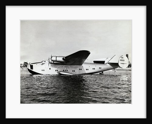 Yankee Clipper Hydroplane Docked in Water by Anonymous
