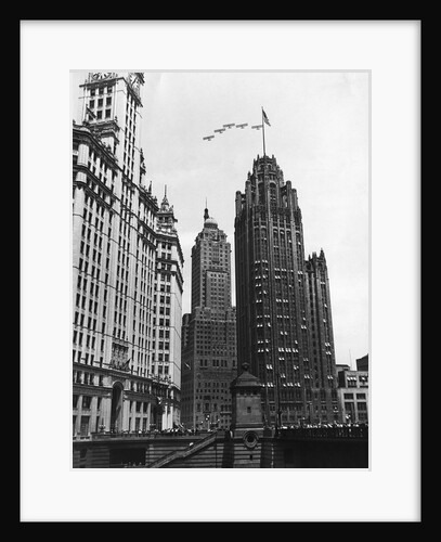 Planes Fly Over Buildings in Chicago by Anonymous