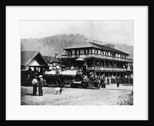 Railroad Passing Through Small Town by Anonymous