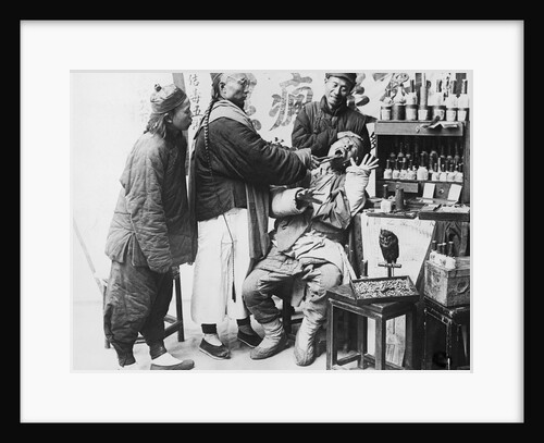 Dentist Working on Patient by Anonymous