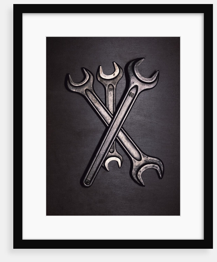 three open-ended slugging wrenches by Anonymous