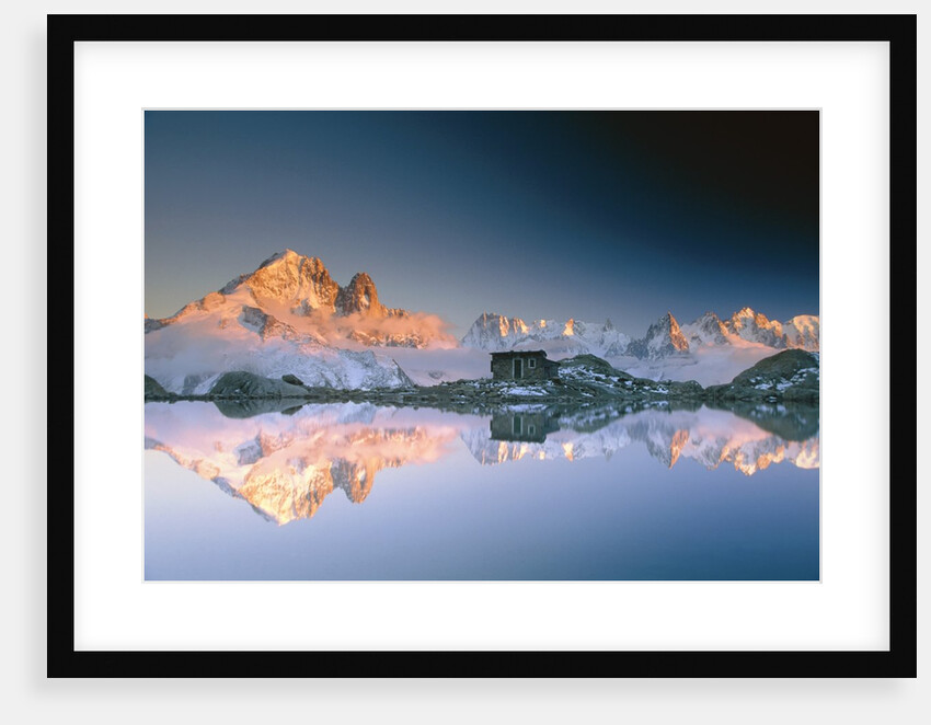 Aiguille Verte and and Mont Blanc Massif reflected in Lac Blanc at sunset by Anonymous