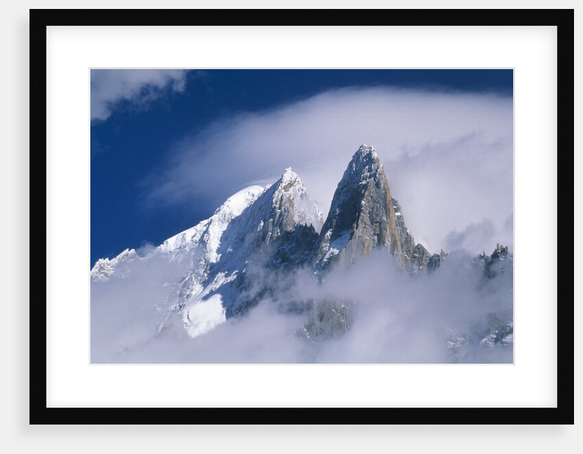 France, Alps, Mont Blanc Massif, Aiguille Verte, peak in clouds by Anonymous