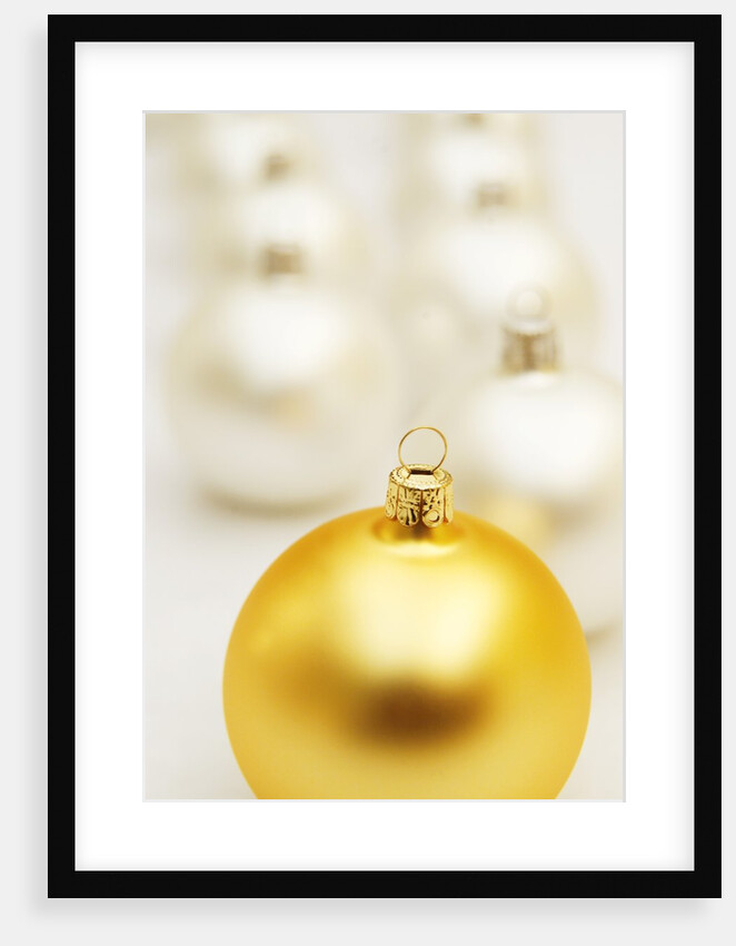 White Christmas tree decorations and a yellow one by Anonymous