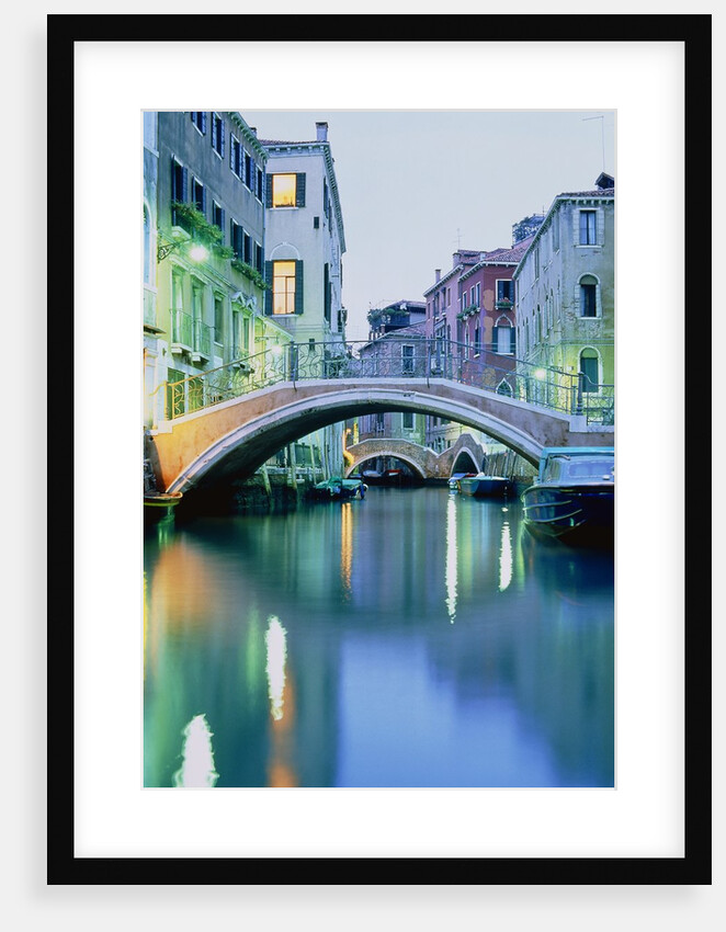 Bridge above a channel in Venice, evening shot by Anonymous