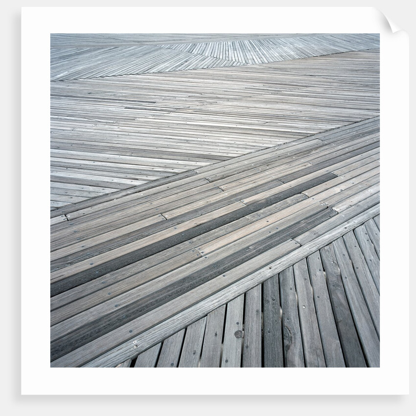 High angle view of wooden deck with planks set at an angle by Anonymous