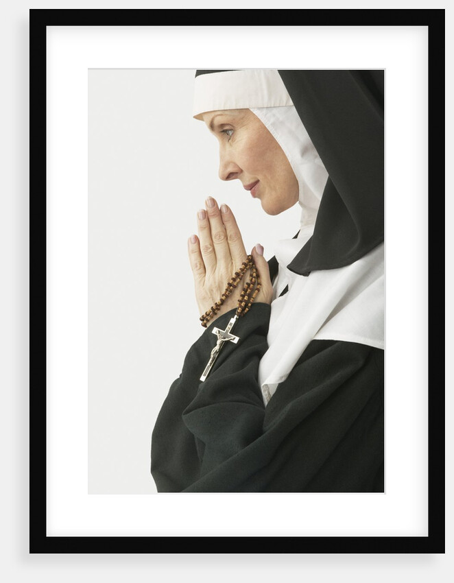 Praying Nun Holding Rosary by Anonymous