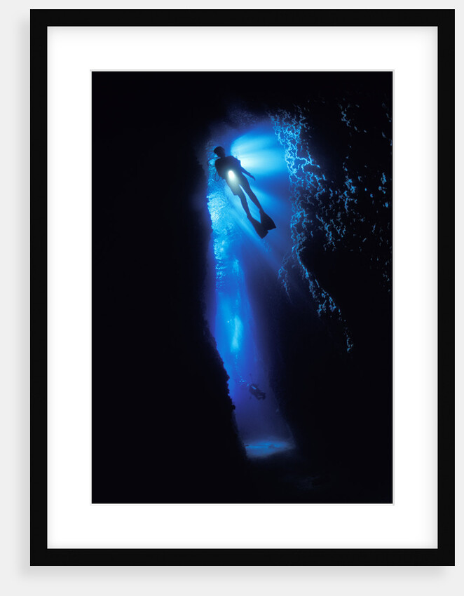 Scuba Diver in Reef Crevice by Anonymous