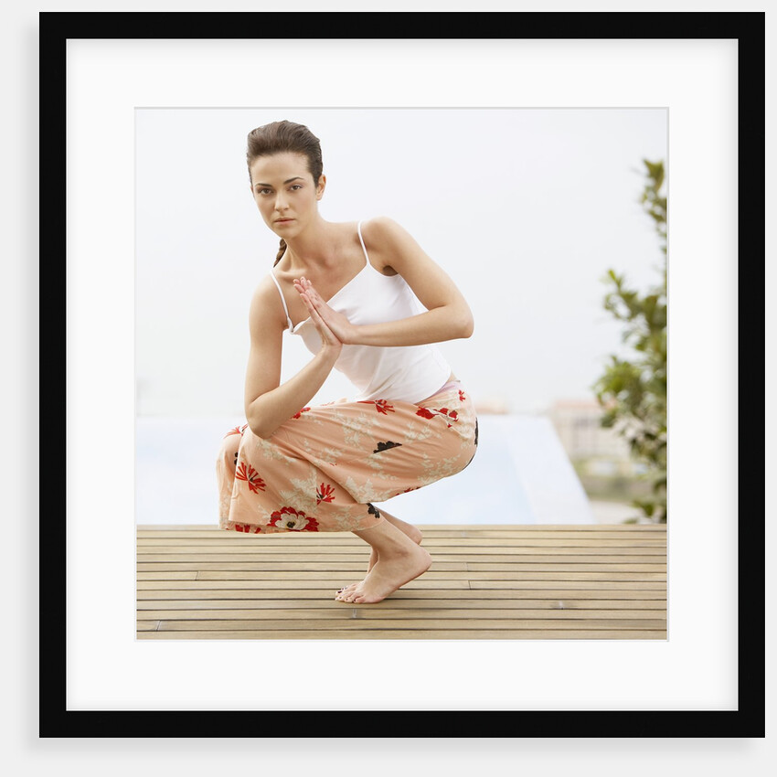 Woman Practicing Yoga by Anonymous