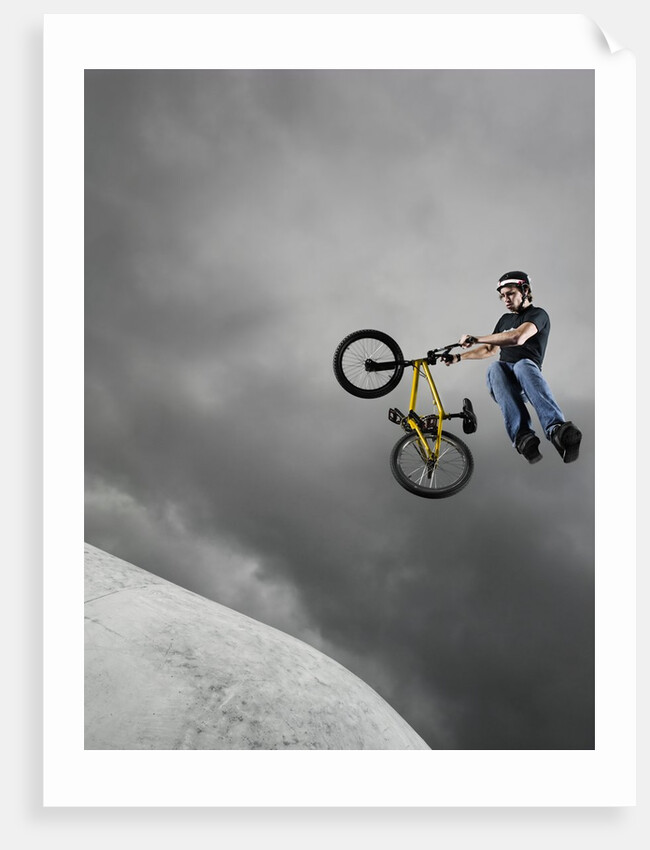 BMX Biker Performing Tricks by Anonymous