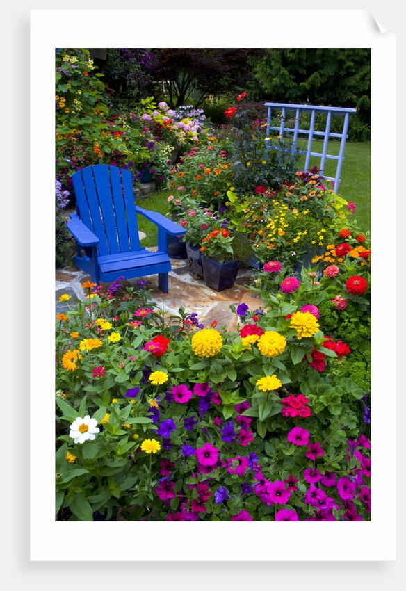 Backyard Flower Garden With Chair by Anonymous