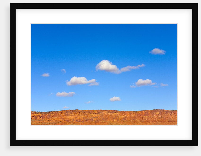 Small Cumulus Clouds Above Vermilion Cliffs by Anonymous